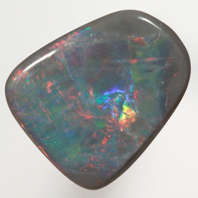 SOLID BLACK OPAL Bright rolling flashes of red to green SEE VIDEOS